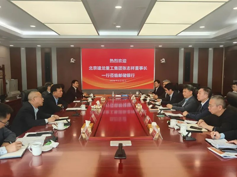 Zhang Zhixiang, chairman and president of Jianlong Group, and his delegation visited the Postal Savings Bank of China